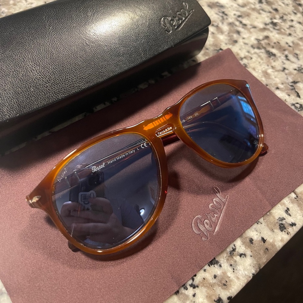 Persol PO9649S 
Size: Standard
Front Color Terra Di Siena
Lens Color Light Blue
